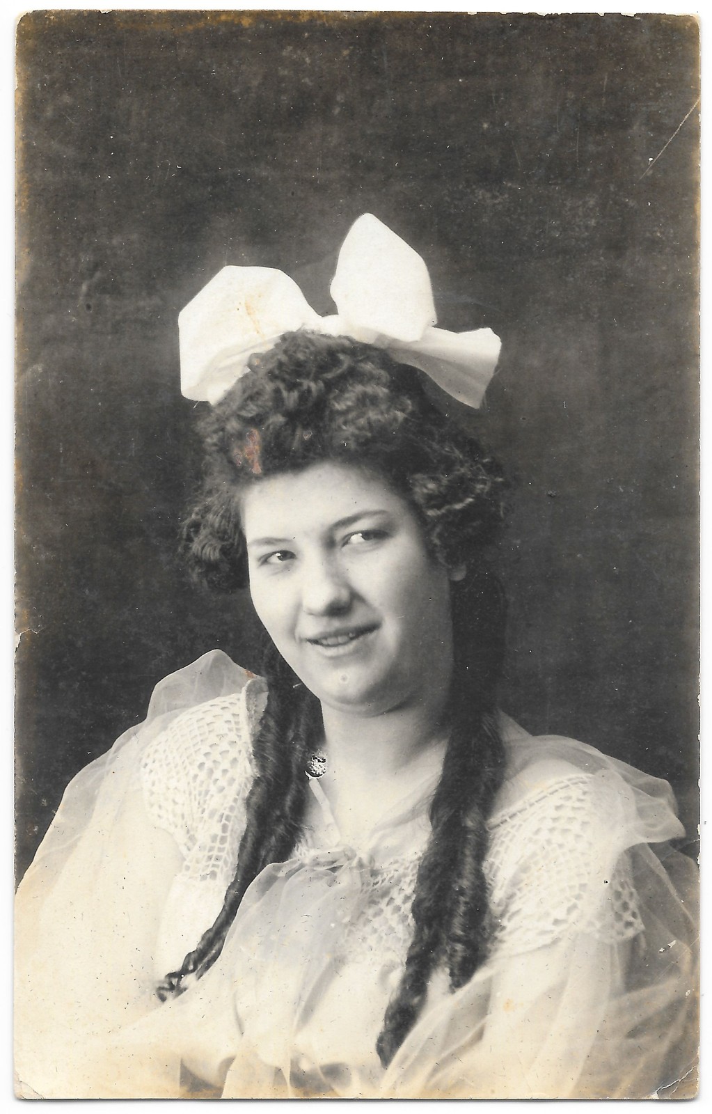 RPPC c1910s Studio Portrait Young Woman Big Bow Curls Real Photo Postcard