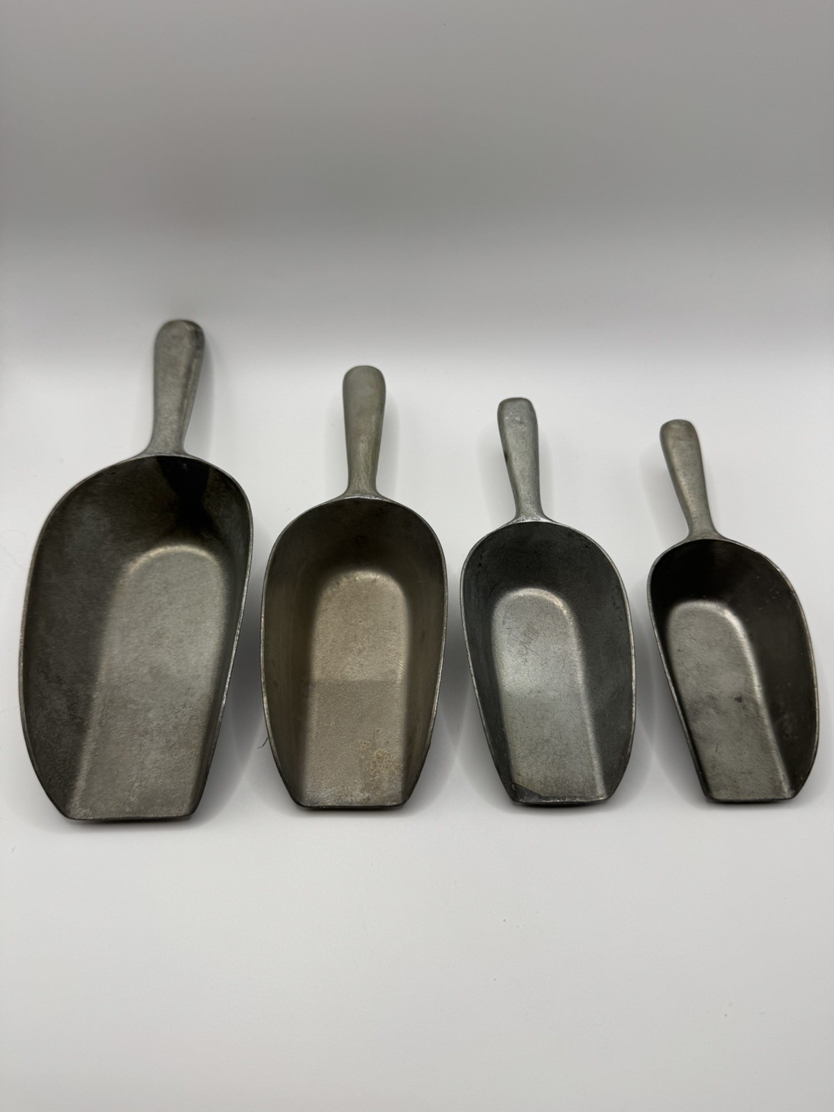 Vintage Set of 4 Cast Aluminum Measuring Scoops Made In Germany 135-185. 