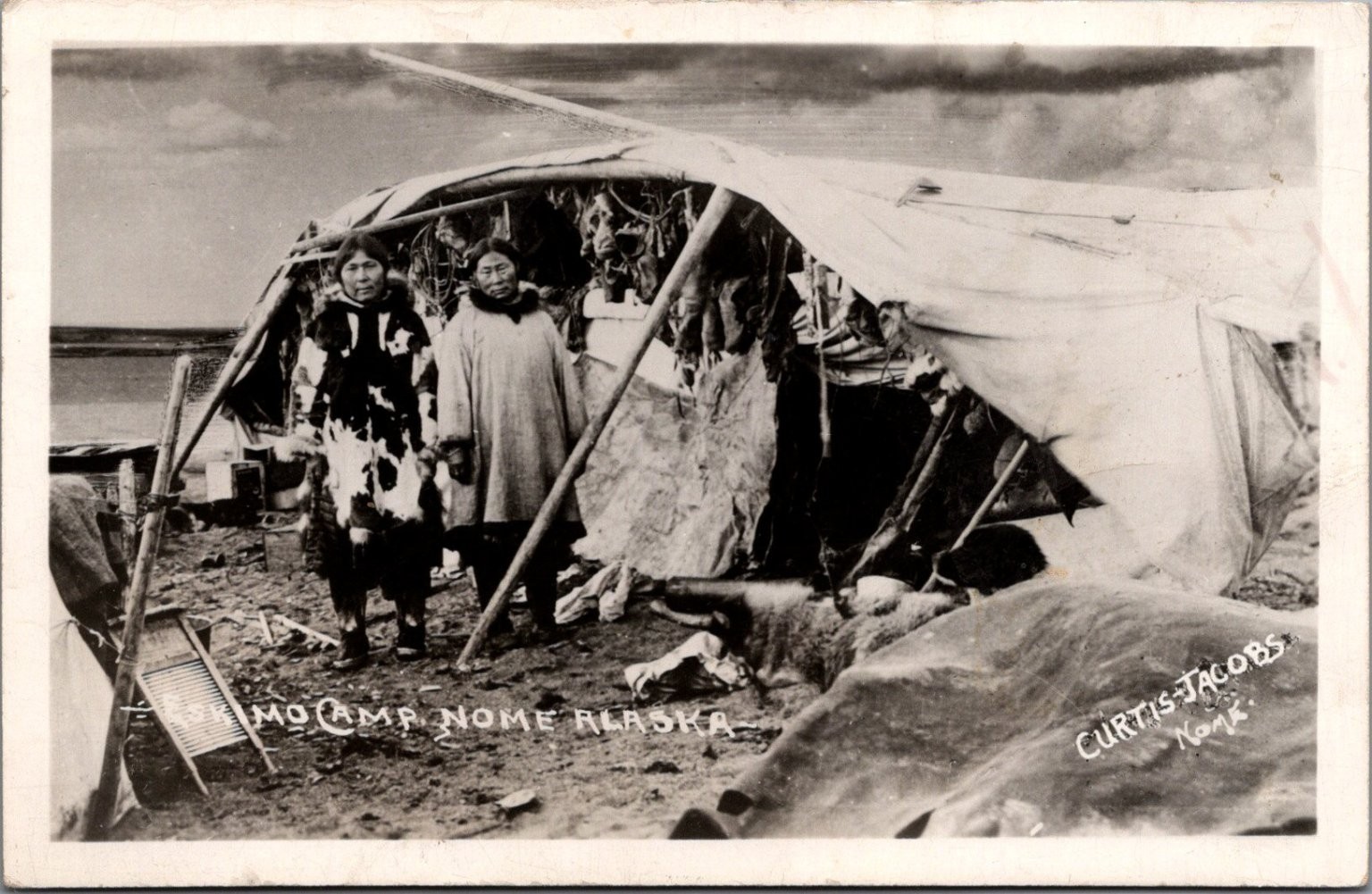 RPPC Eskimo Camp Nome Alaska Curtis-Jacobs Indigenous People Fur Drying 1910s