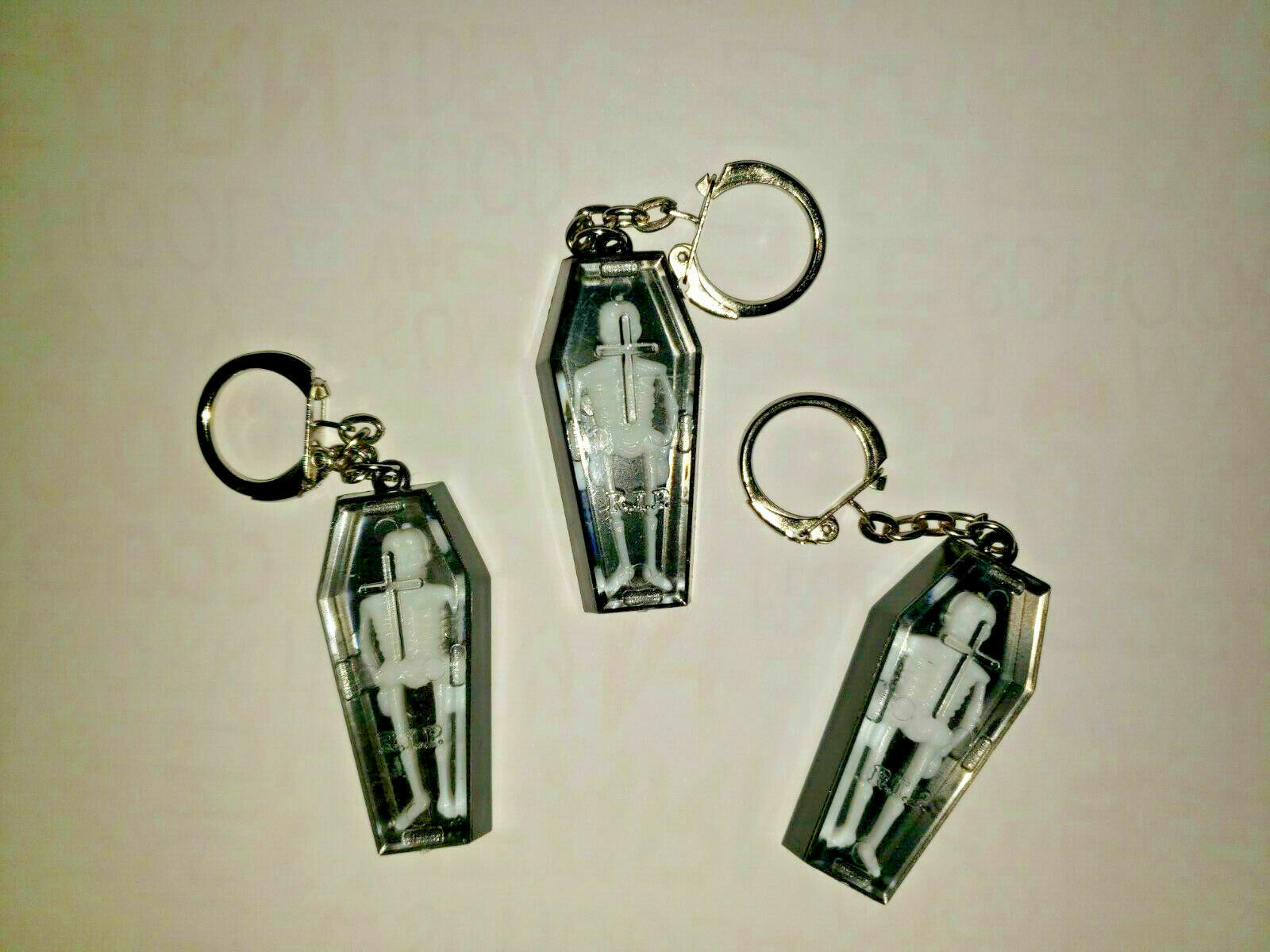 Vintage Skeleton in Coffin Keychain Charm Vending Machine Toy Lot of 3 SKU 155
