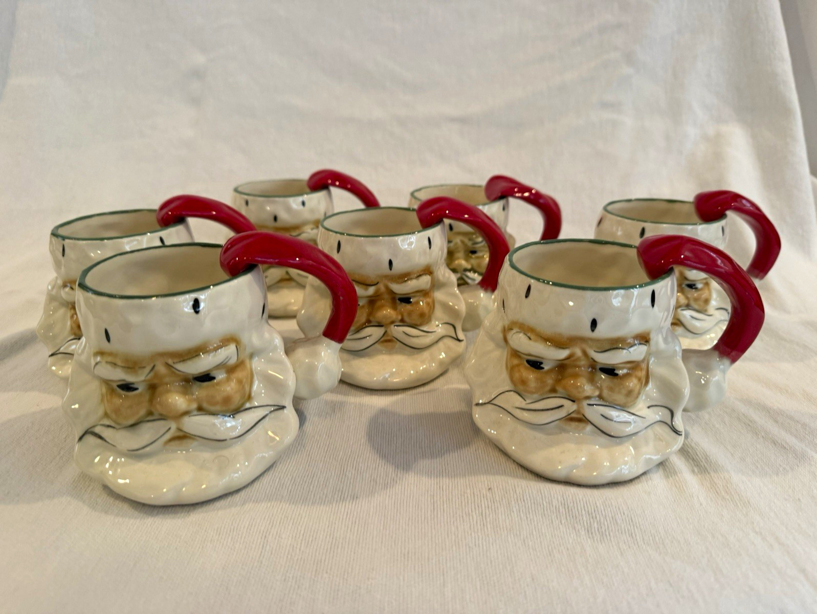Vintage 1951 Riddell Pottery Santa Claus Face Mugs Painted Ceramic Set of 7 Vintage 1951 Riddell Pottery Santa Claus Face Mugs Painted Ceramic Set of 7
