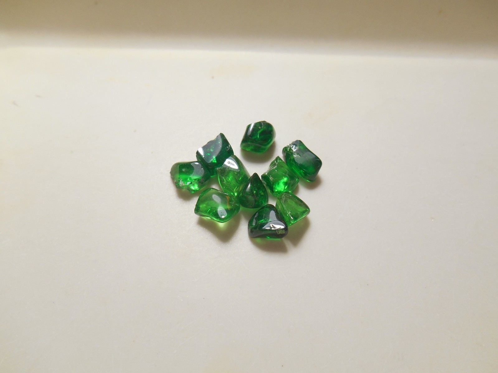 Tsavorite faceting rough parcel. 15.5 cts - 1.3 - 1.7 cts. clean . Kenya.