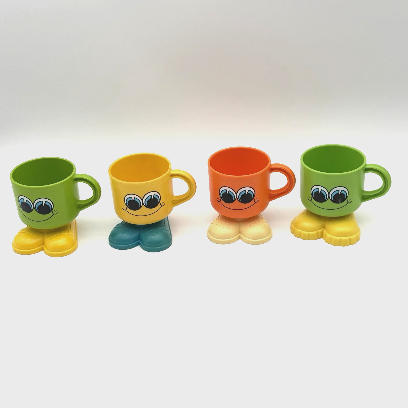Vintage Deka Footsie Tootsie Plastic Mugs Set of 4 Retro 1970s Novelty Cups
