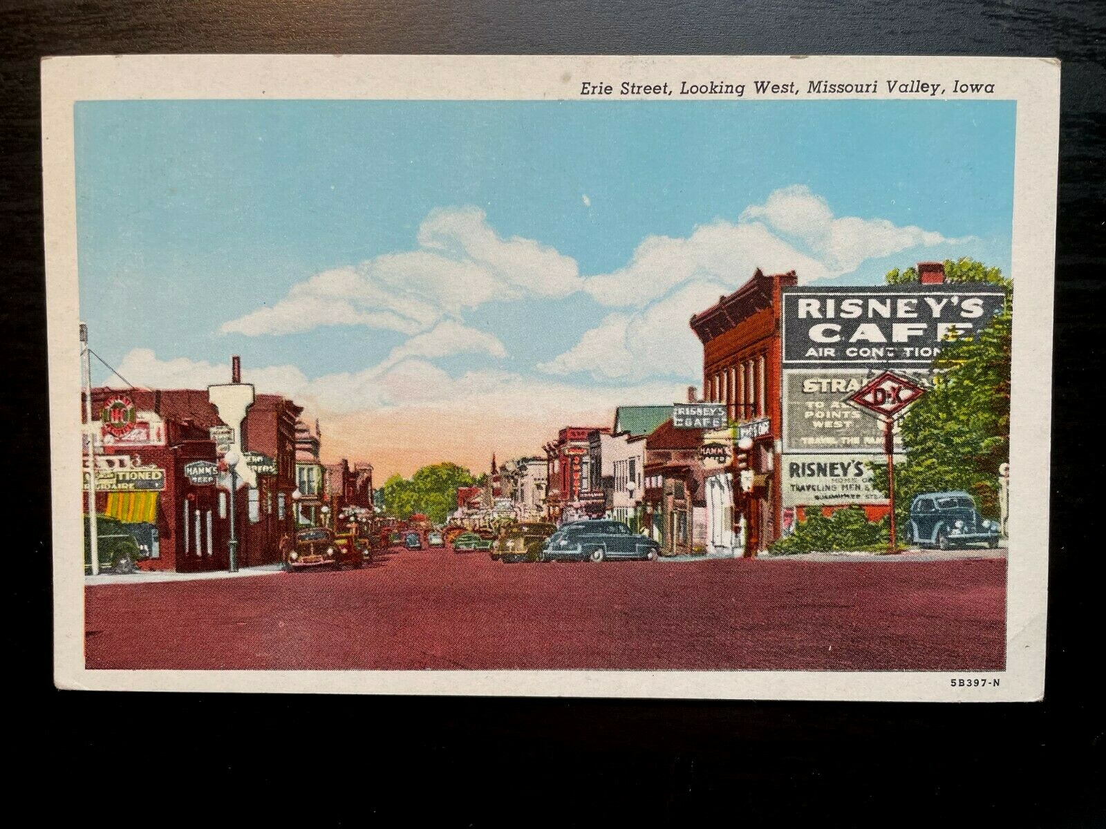 Vintage Postcard 1945 Erie Street Stores and Old Cars Missouri Valley Iowa (IA)