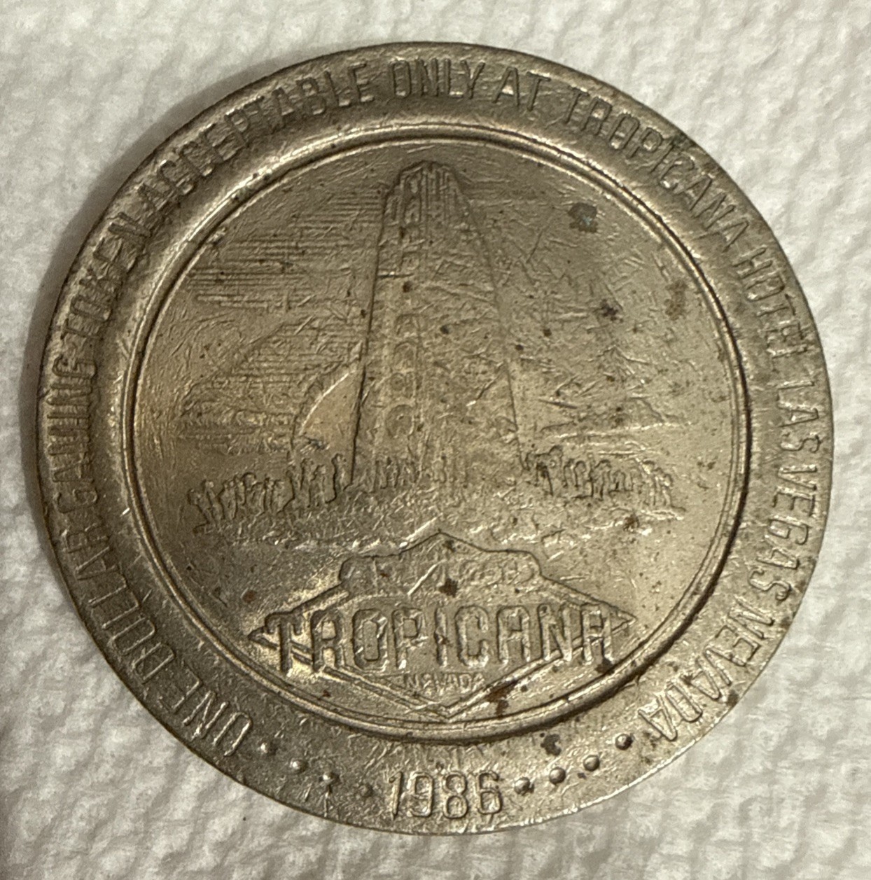 TROPICANA A RAMADA RESORT CASINO 1986 $1 ONE DOLLAR GAMING COIN/TOKEN -Las Vegas