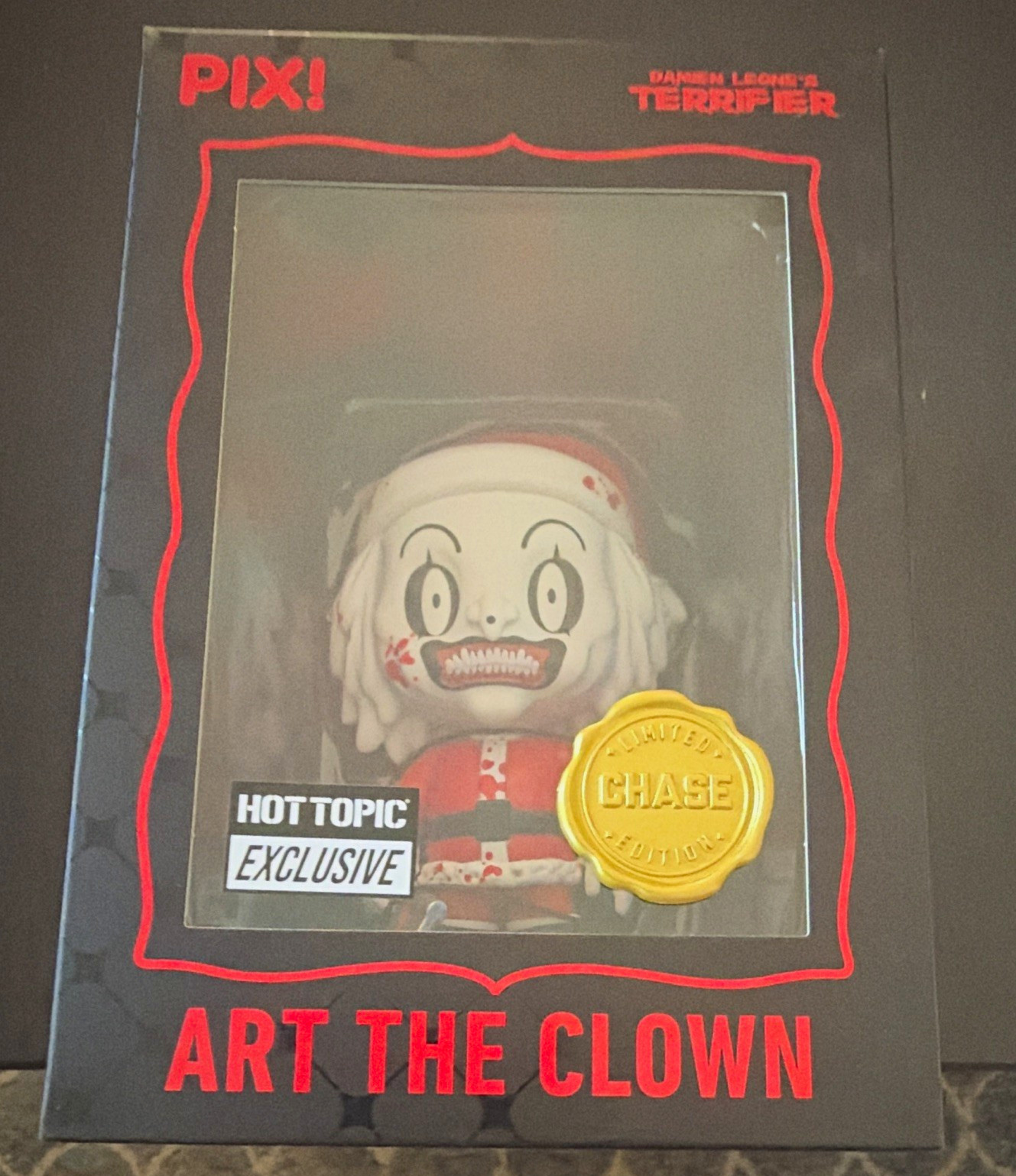 Thrilljoy Pix  Terrifier Art the Clown Chase Bloody Santa Hot Topic Exclusive