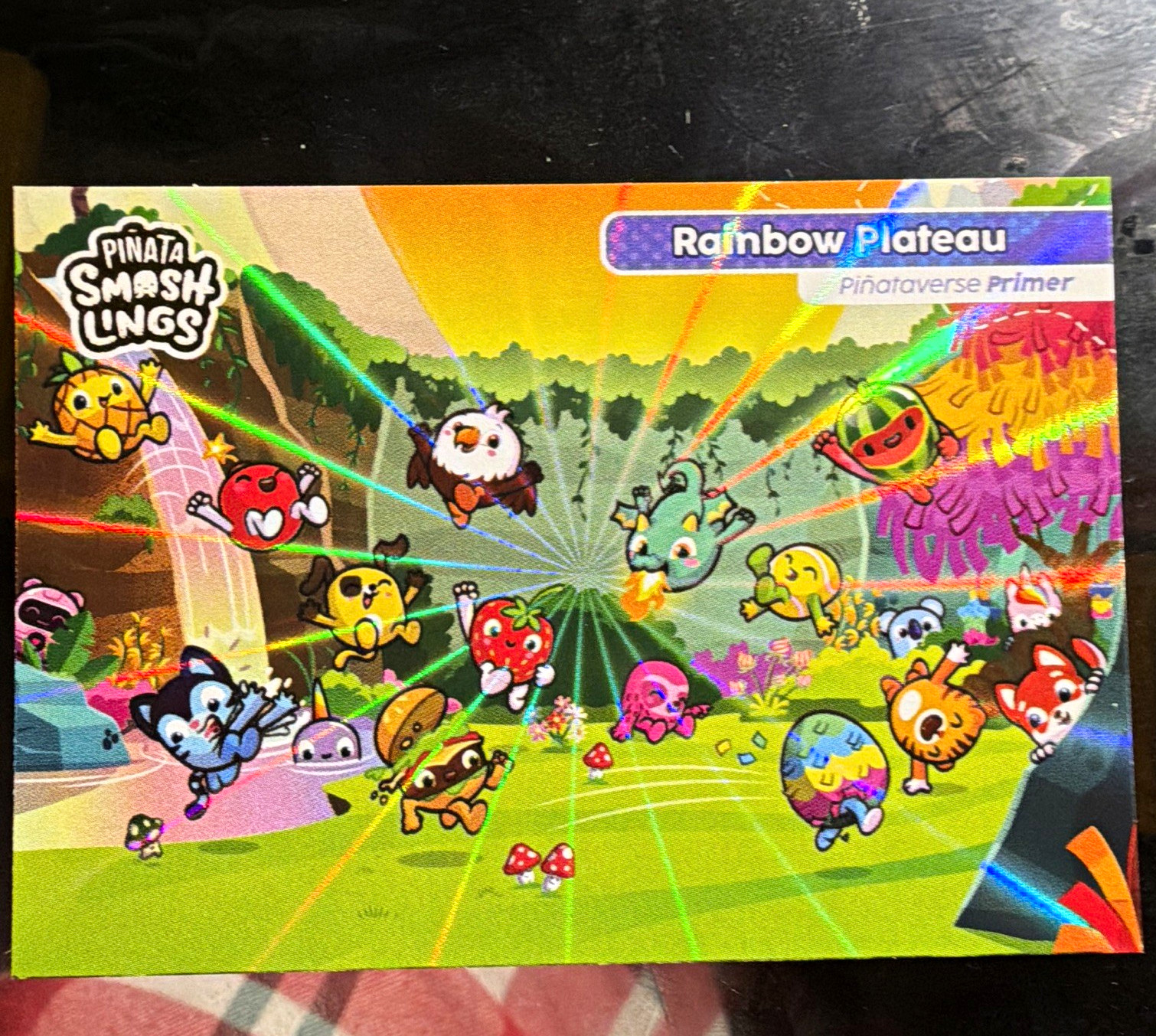 2024 Topps Piñata Smashlings Piñataverse Primer #12 Rainbow Plateau Holographic