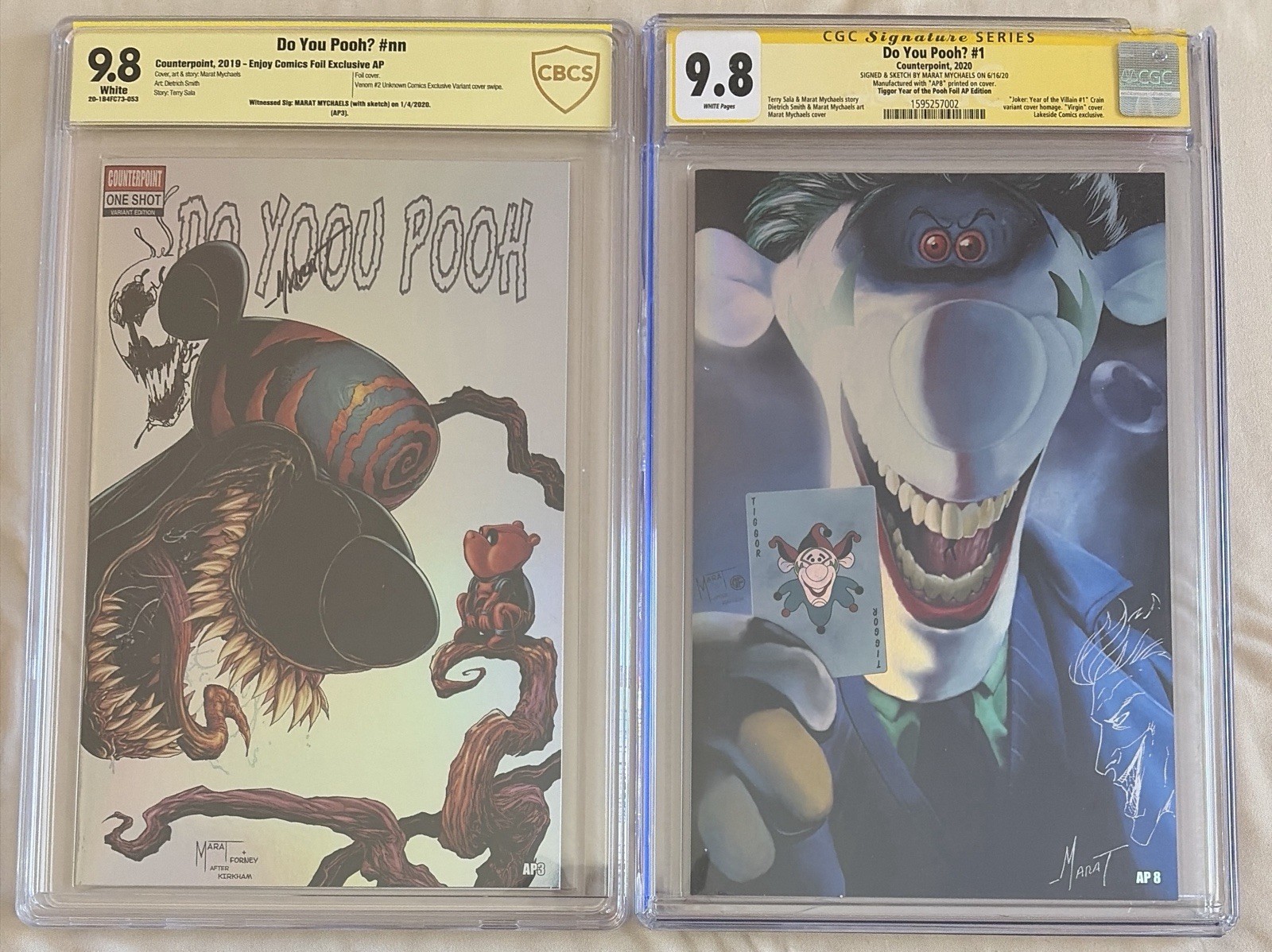 Do You Pooh carnage remark CBCS 9.8+Joker remark CGC 9.8 w/damaged case see pics