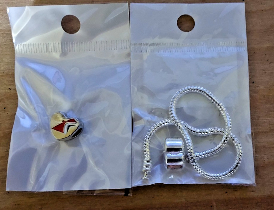 Brand New Carnival Cruise HEART SHAPED Charm And Bonus Bracelet