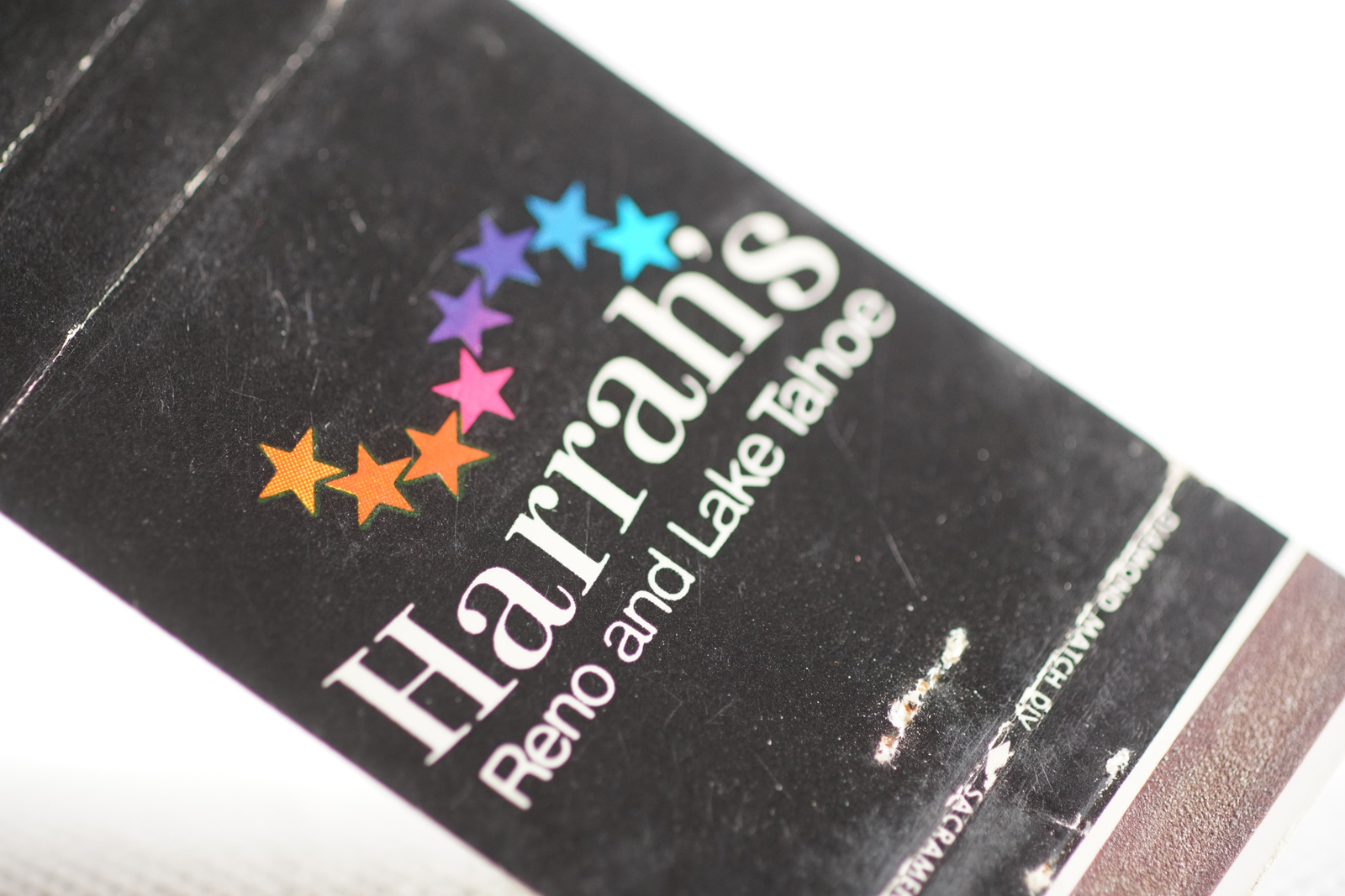 Harrah's Casino Reno & Lake Tahoe Nevada Star rainbow Matchbook Cover