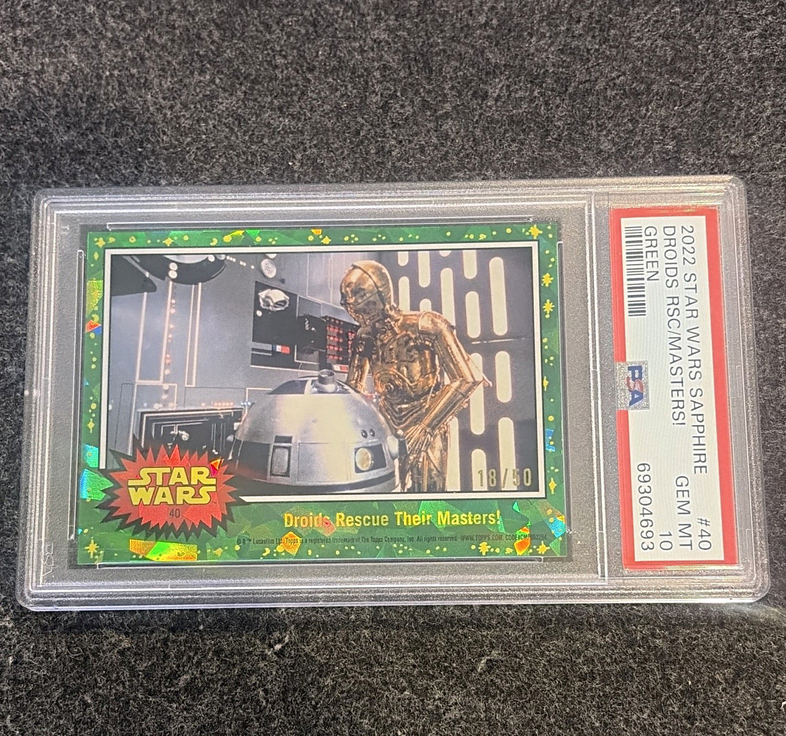 Topps 2022 Star Wars Sapphire #40 Droids Rescue Their Masters Green 18/50