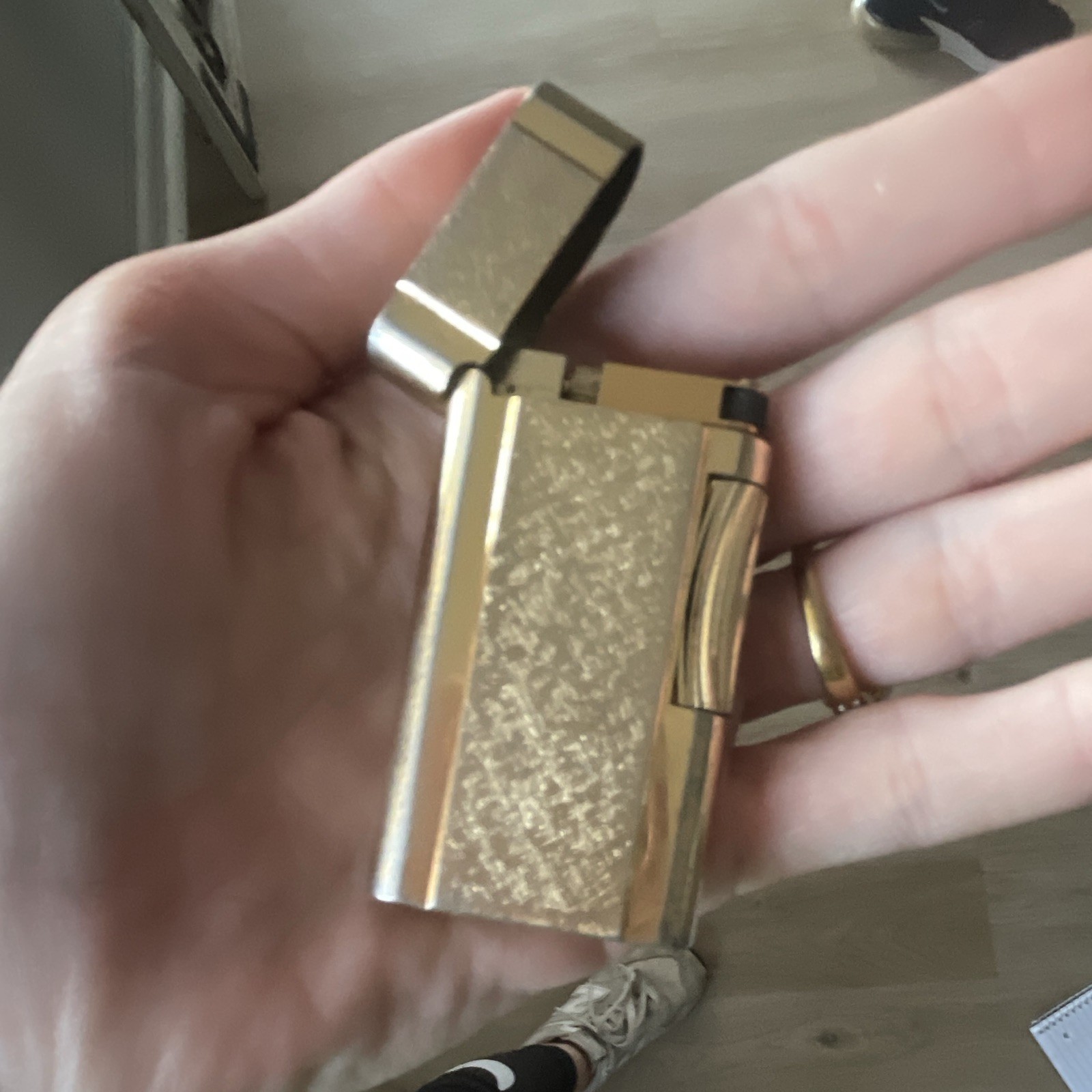 Zippo Gold Tone Flip-Top Collectible Lighter with Textured Design vintage zippo
