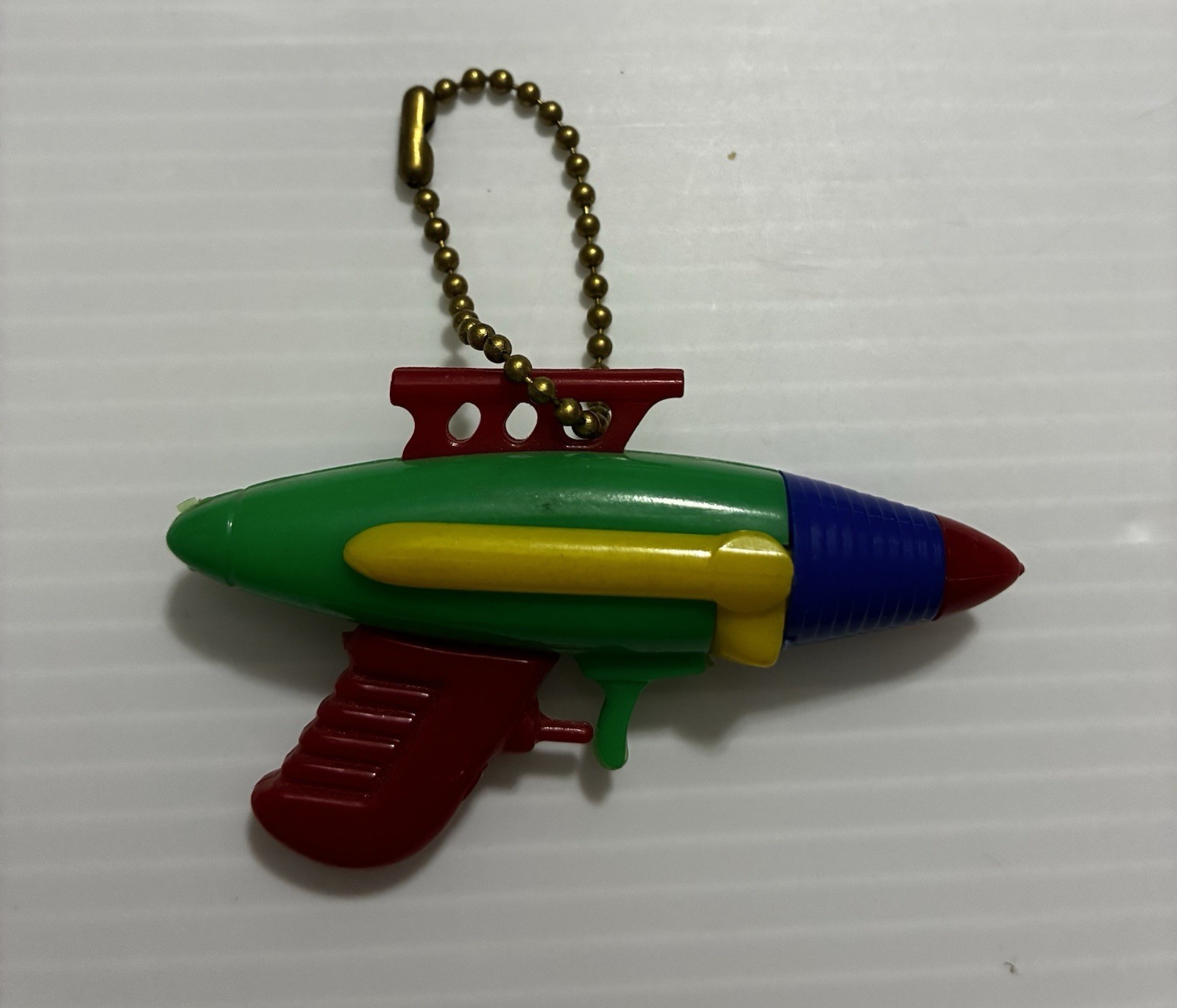 Vintage 1950’s Space Gun/Ray Gun Puzzle Keychain