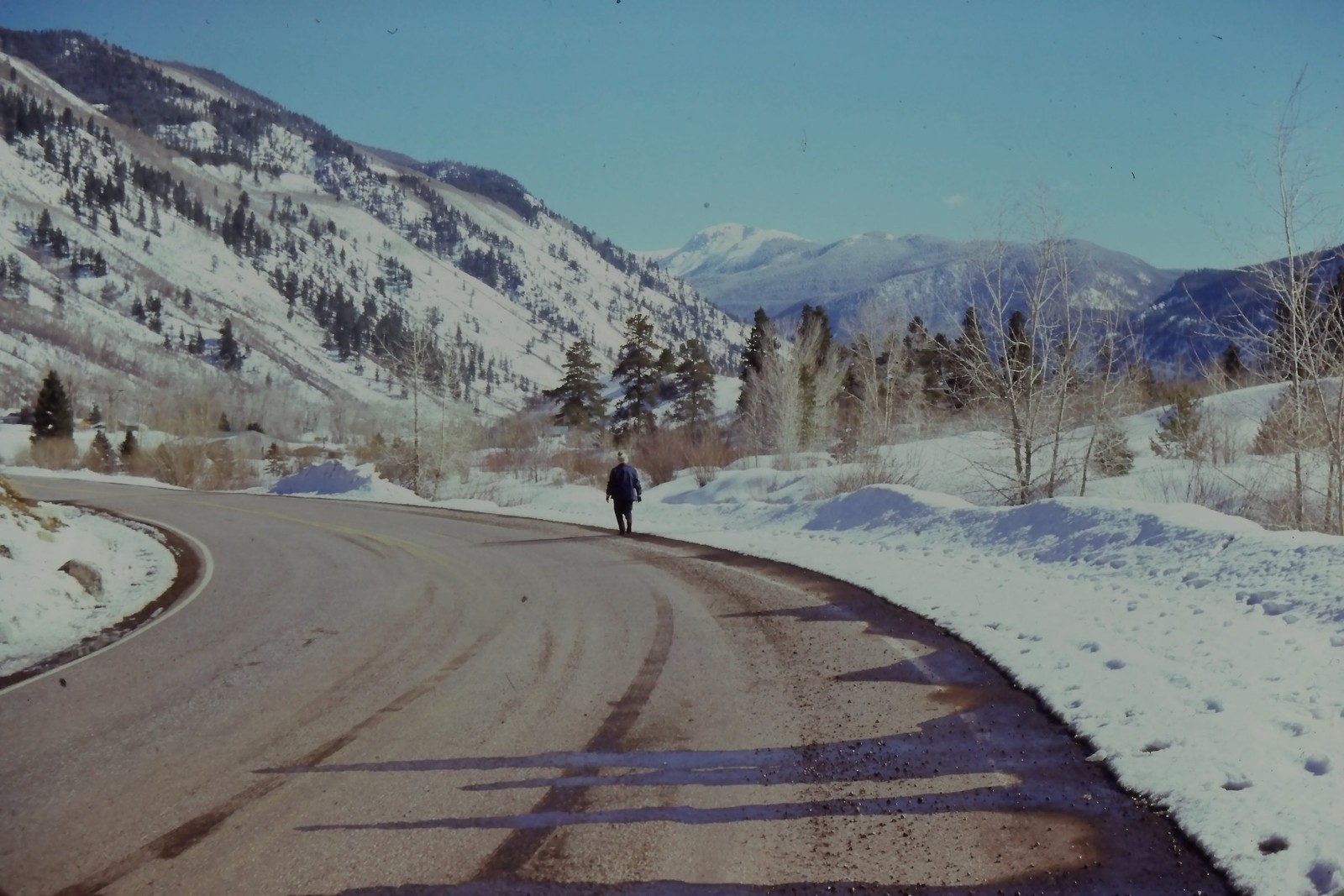 c1960's Kodachrome 35mm Slide Lone Person Walking Snowy Mountain Road Aspen