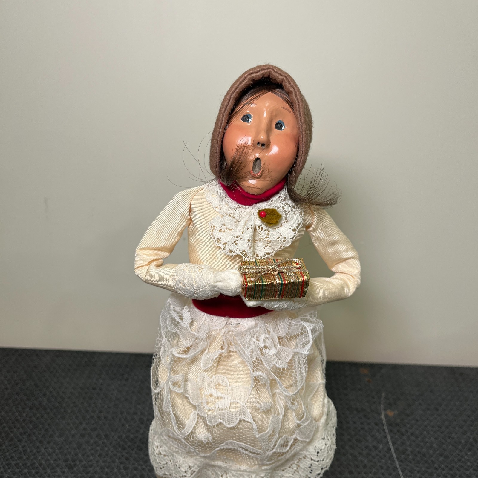 Byers Choice Caroler Woman holding Present, White Dress, Long Brown Hair, 1993 Byers Choice Caroler Woman holding Present, White Dress, Long Brown Hair, 1993