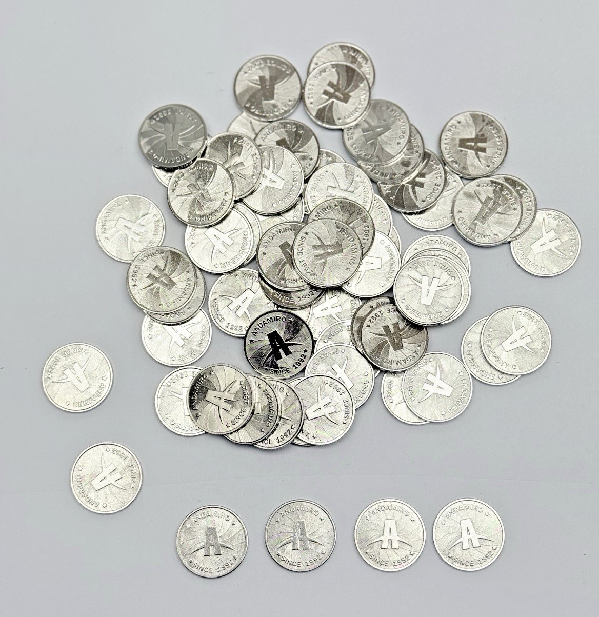 LOT OF 50, ANDAMIRO ARCADE COIN (1992)
