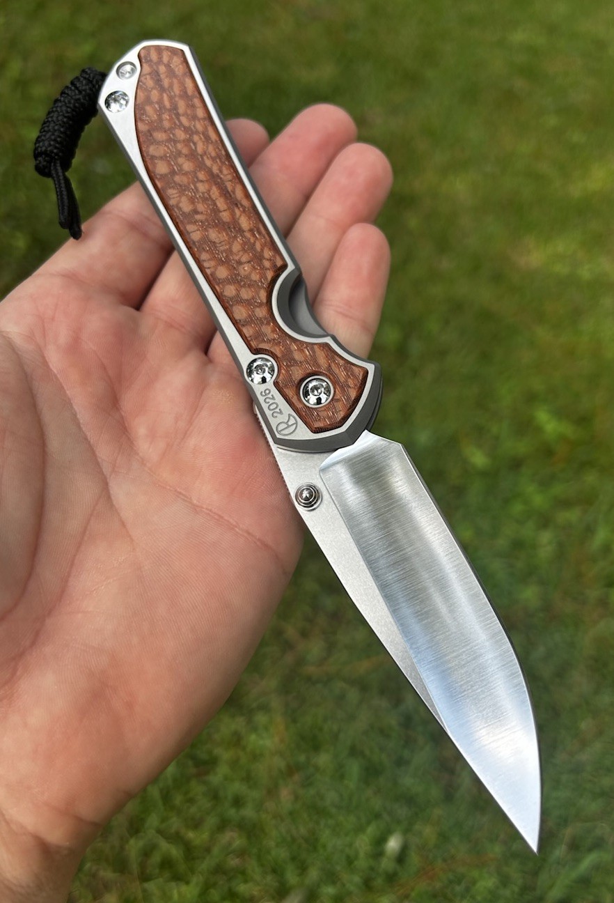 Chris Reeve Large Sebenza 31 Annual 2026 Leopard Wood Inlays, Polished Magnacut