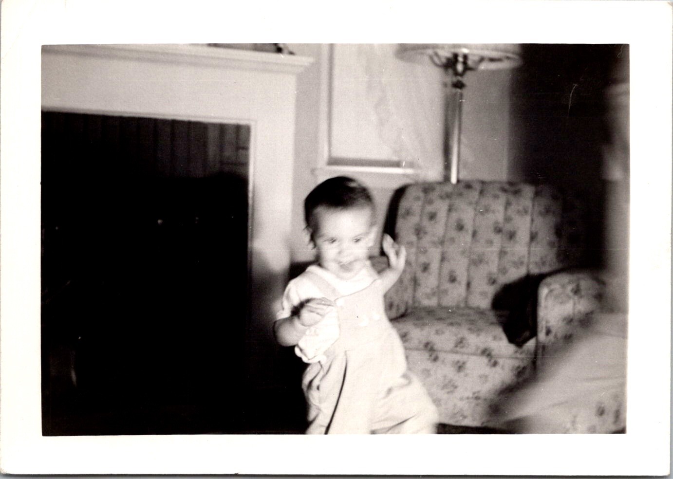 Joyful Toddler Walking in Living Room, 1950s B&W Snapshot Photo