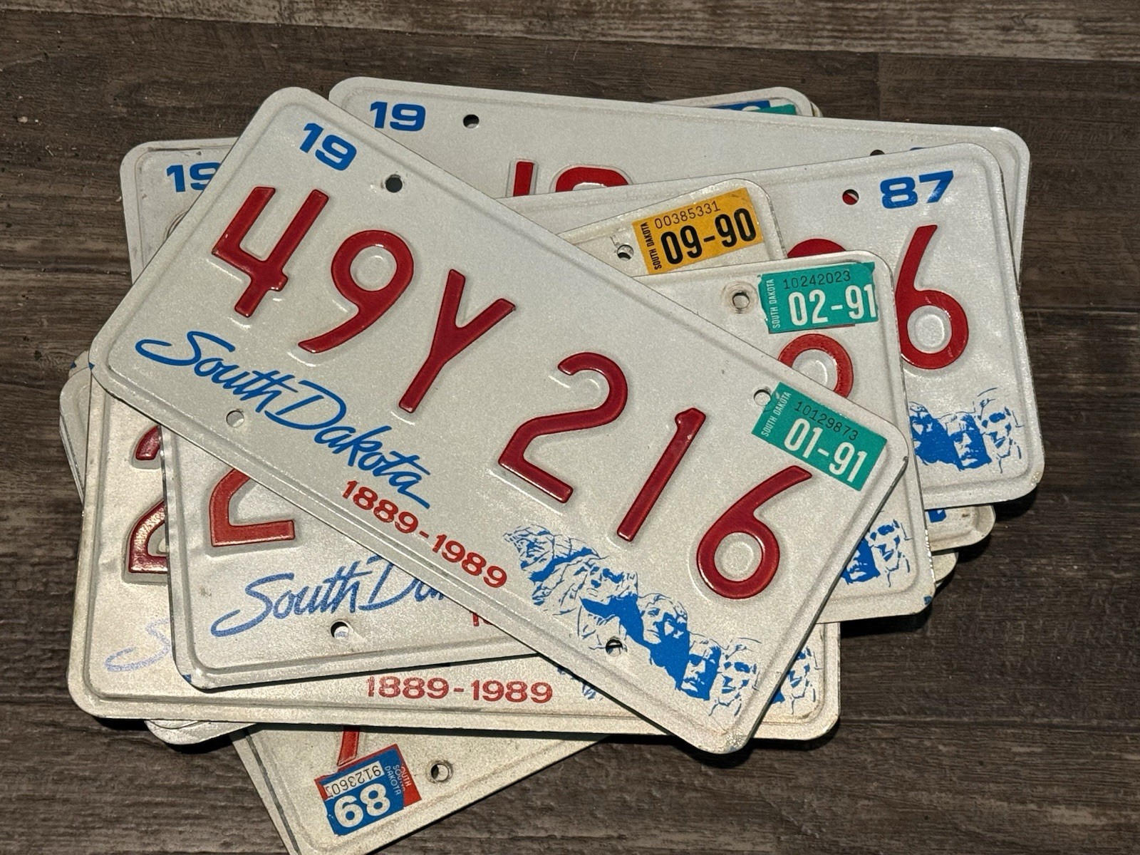20- South Dakota Embossed License plates-1987-91 Mount Rushmore-good Shape
