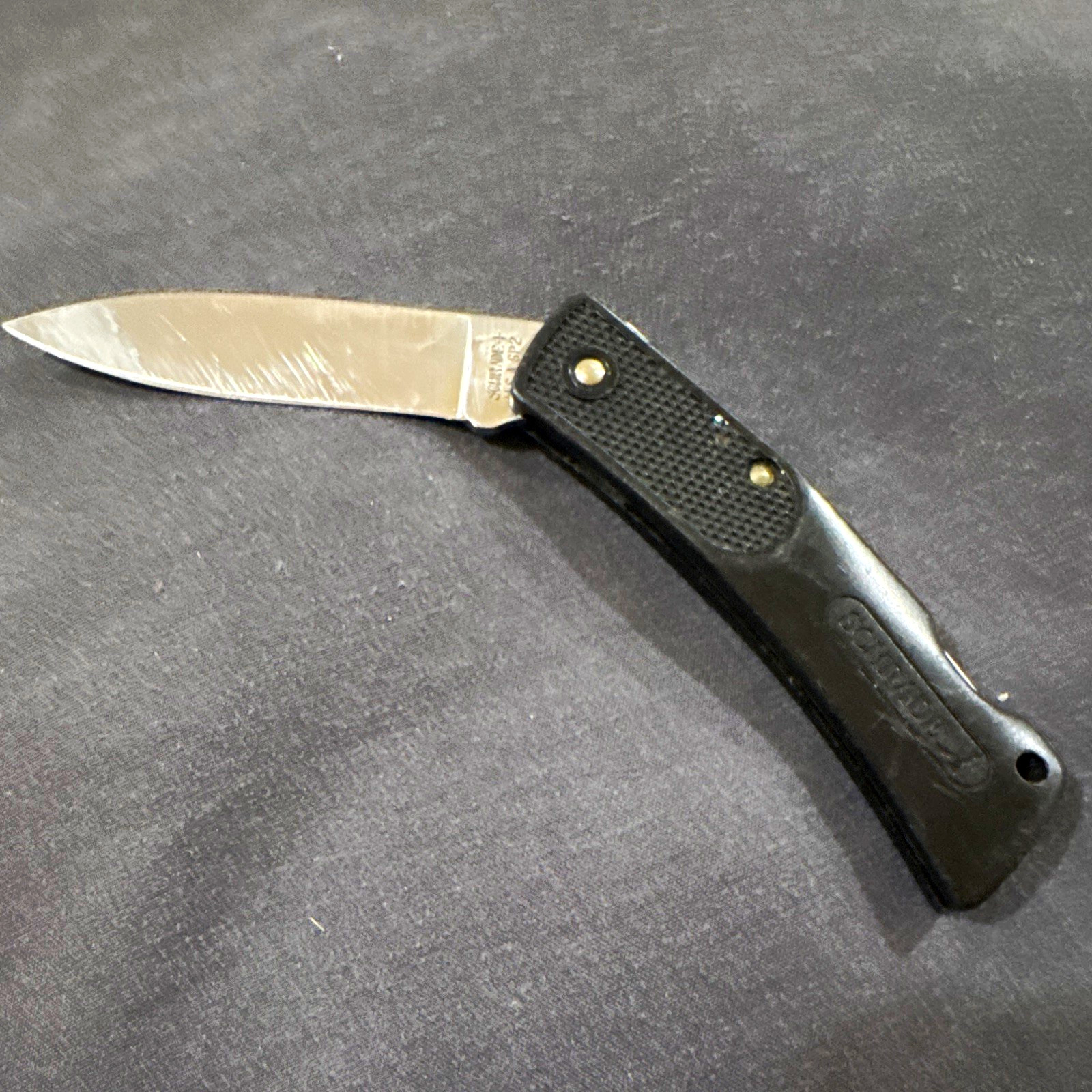 Buck 110 Folding Hunter Lockback Clip Point Plain Edge SS Blade Black Handle