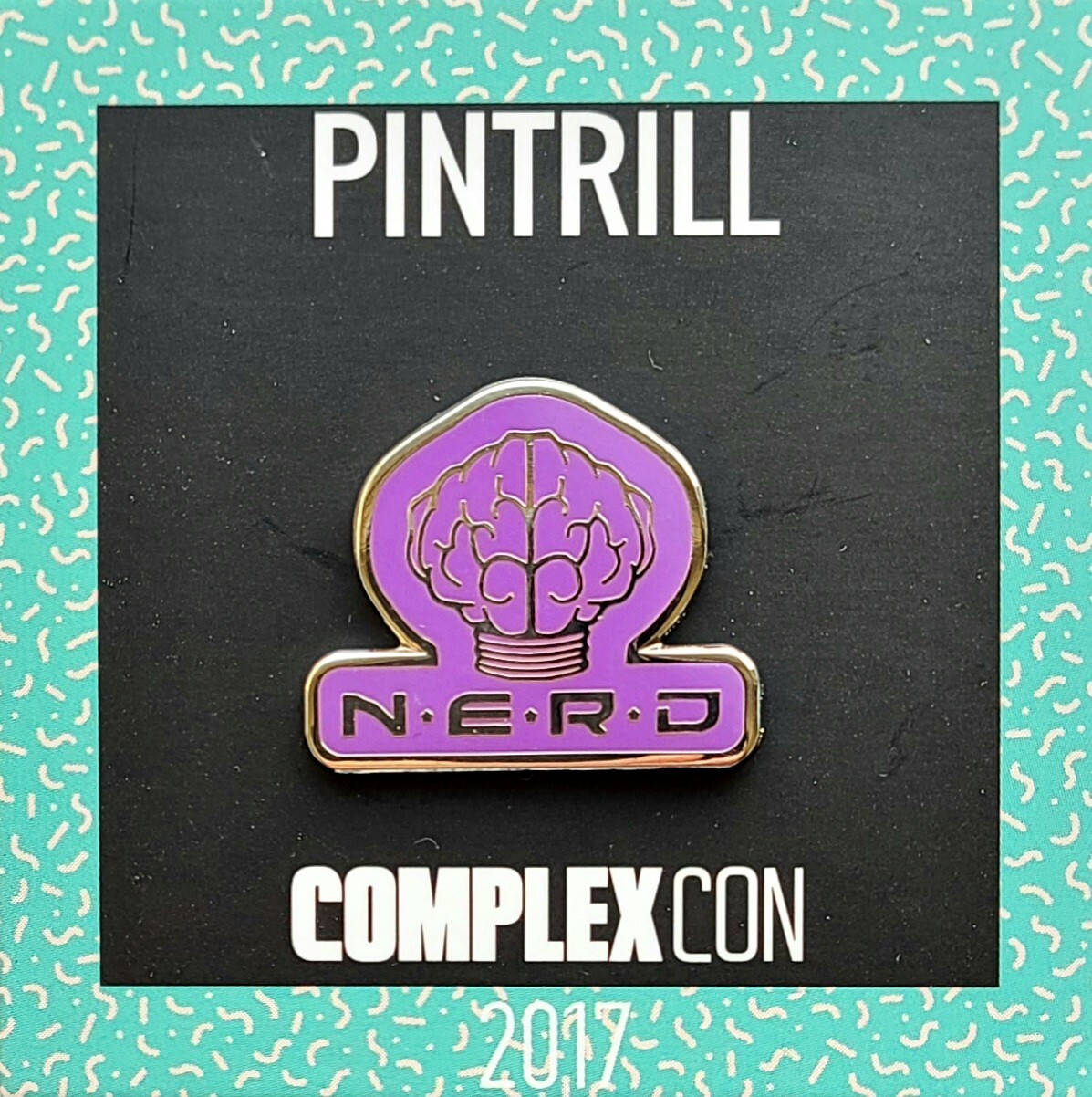 ⚡️RARE⚡️ COMPLEXCON x PHARRELL WILLIAMS N.E.R.D. PIN *BRAND NEW* 2017 LE  🧠 🎵
