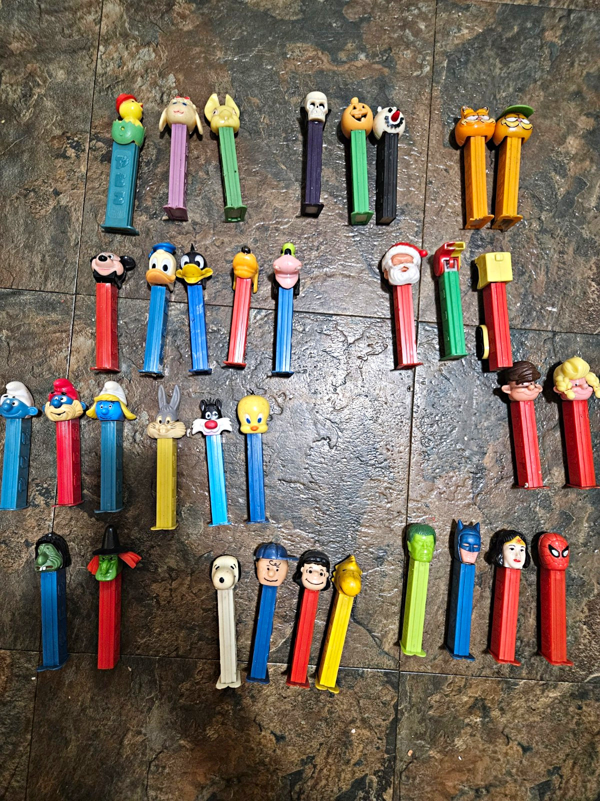 Lot of 34 PEZ Dispensers Cartoon Characters Disney Warner Bros Snoopy Garfield Lot of 34 PEZ Dispensers Cartoon Characters Disney Warner Bros Snoopy Garfield