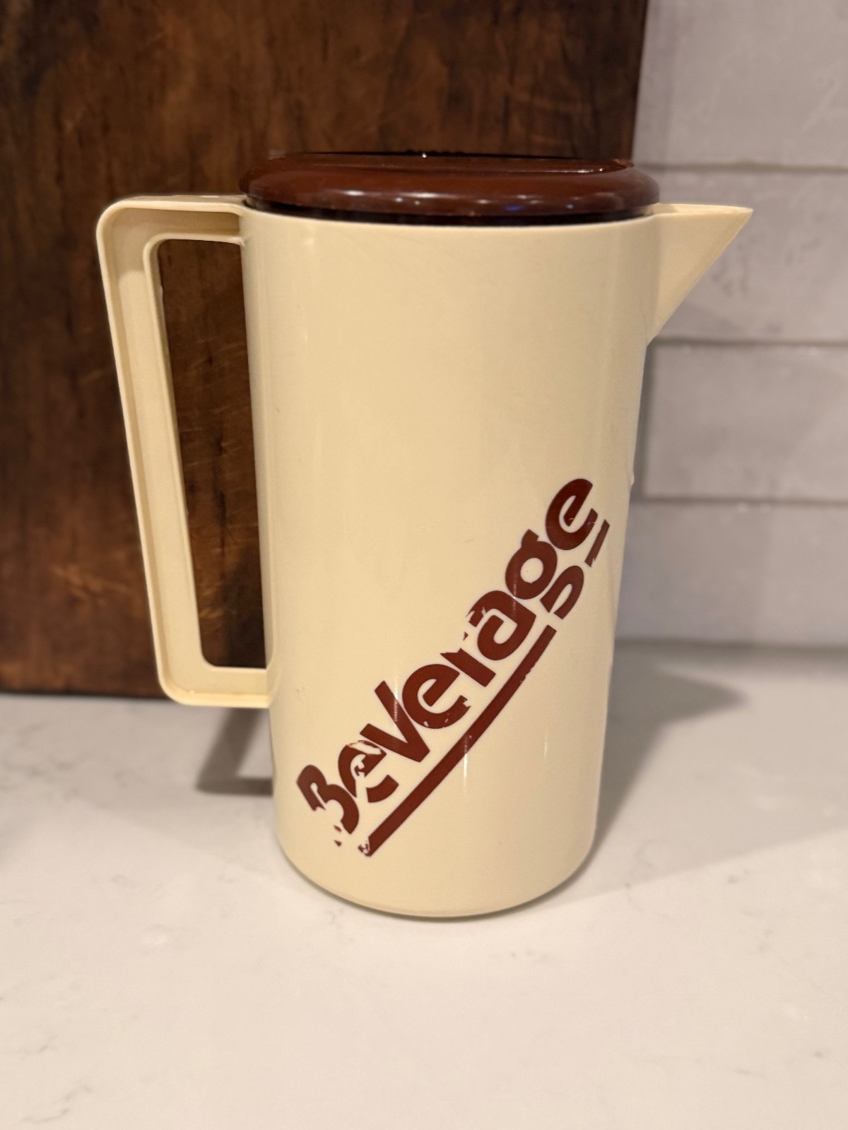Vintage 1980s Beverage Pitcher cream with Brown Lid and writing