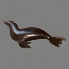 vintage hand-carved ironwood sculpture with a polished, dark brown 12” picture