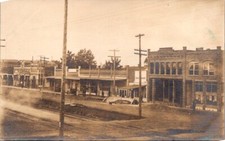 RPPC Postcard Main Street in Town Restaurant Train Tracks c.1904-1920s 12577 picture