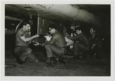 Loading a Bomb onto a US Air Force F-100 A/C Bomber 1960's picture