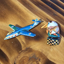 Lot of 2 Vintage Tin Pinback Pins Blue Airplane & Bird Character Japan picture