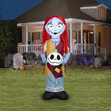 Disney 5 ft. Inflatable Light Sally in Orange Dress with Skull Halloween Décor picture