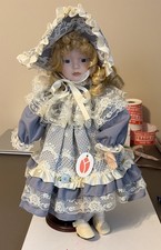 Delton Product Collectibles 10” Porcelain Doll W/Stand Blonde Curly Hair Light picture