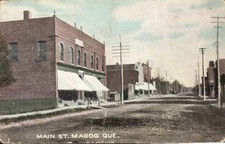 Magog Quebec - Main Street Stores and Awnings - Antique Postcard - circa 1910 picture