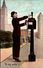 1909 Comic Postcard - Exaggerated Tall Man Mailing Letter