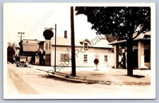 K56/ Clarksville Michigan RPPC Postcard c1940s Shell Gas Station Stores 375 picture