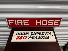 Vintage Red White Fire Hose & Capacity 250 Persons Signs picture