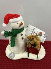 HALLMARK 2024 WRAPPED IN JOY SNOWMAN MUSICAL MOTION TABLETOP PLUSH picture
