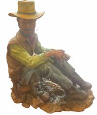 Clint Eastwood Sitting Cowboy Statue picture