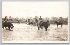 1916 RPPC US Soldiers Driving Mexican Soldiers Horseback Rio Grande River Border picture