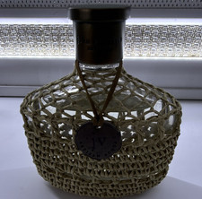John Varvatos Perfume Bottle with Woven Rattan Covering and Cap picture