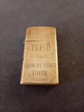 Vintage Zippo Slim Solid Brass Lighter 2000 Engraved USA. picture