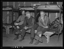 Lumberjacks in their bunkhouse after dinner. Logging camp near Effie, Minnesota picture