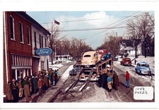 1946 Ford Cars Being Unloaded at Dealership Photo picture