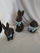 Brown Easter bunny and egg with blue bow decor decode 2 bunnies and a egg picture