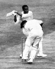 Garfield Sobers swings Benaud four wicket-keeper WGrout ducks - 1961 Old Photo picture