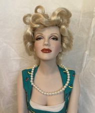 Marilyn Monroe Porcelain On Bench Franklin Mint.  Beautiful picture