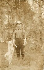 c1910 RPPC; Portrait of Harry Phillips Holding Paw of White Dog Standing Up picture