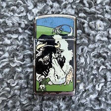 Rare 1993 Slim Zippo Lighter - BARRETT SMYTHE - Resting Cow - Chrome Sold as Is picture