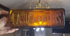 Rare Antique Original “ LASH LIVER “ EMPTY paper label Bitters Bottle picture